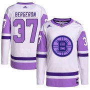 Adidas Patrice Bergeron Boston Bruins Men's Authentic Hockey Fights Cancer Primegreen Jersey - White/Purple