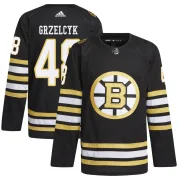 Adidas Matt Grzelcyk Boston Bruins Youth Authentic 100th Anniversary Primegreen Jersey - Black